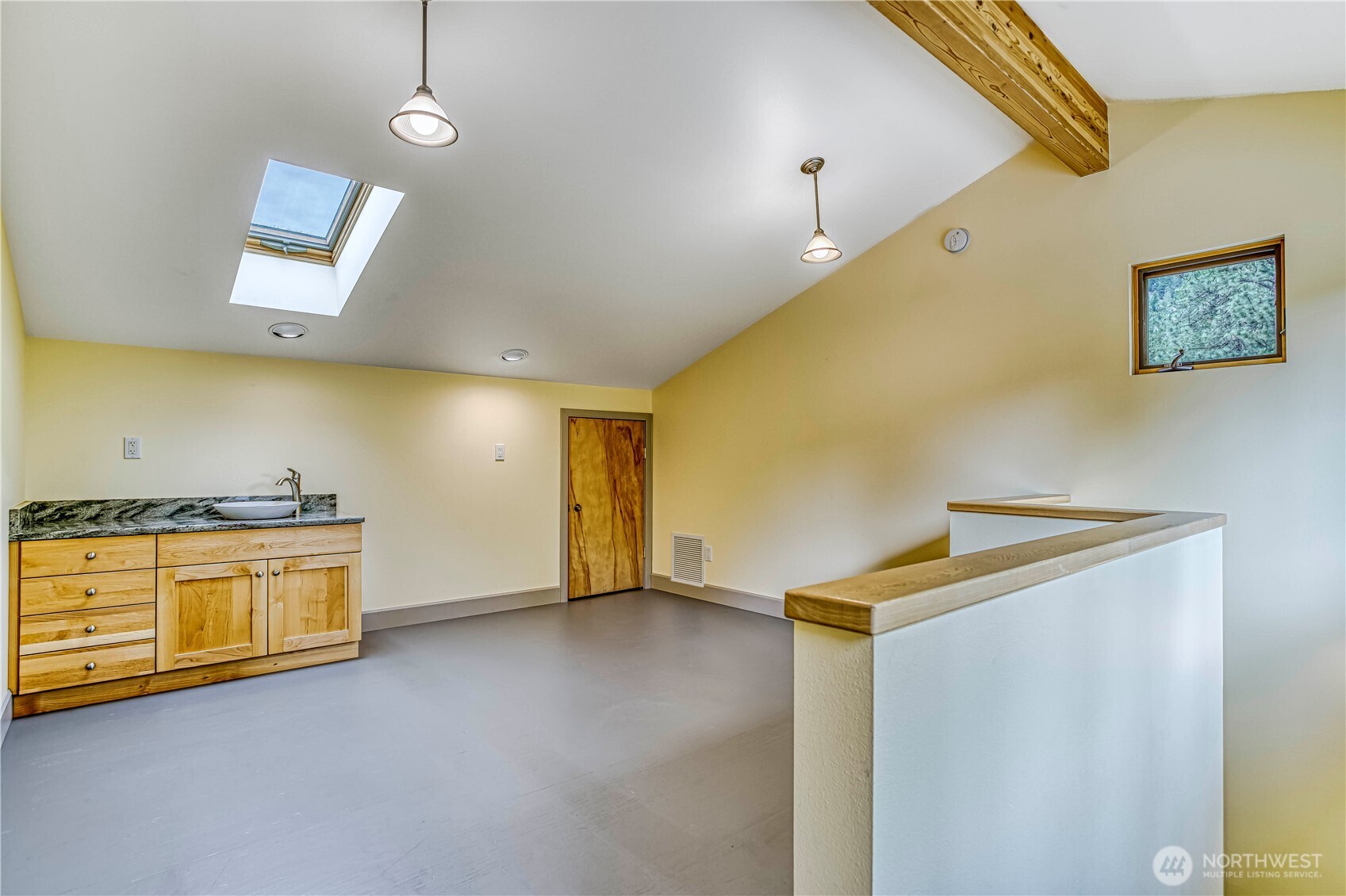 7580 Icicle Road Leavenworth, WA 98826 - Photo 26 of 38 a view of a kitchen with wooden floor and a sink