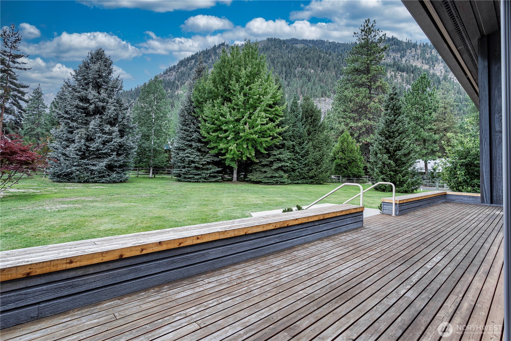 7580 Icicle Road Leavenworth, WA 98826 - Photo 37 of 38 a view of a wooden deck with a yard