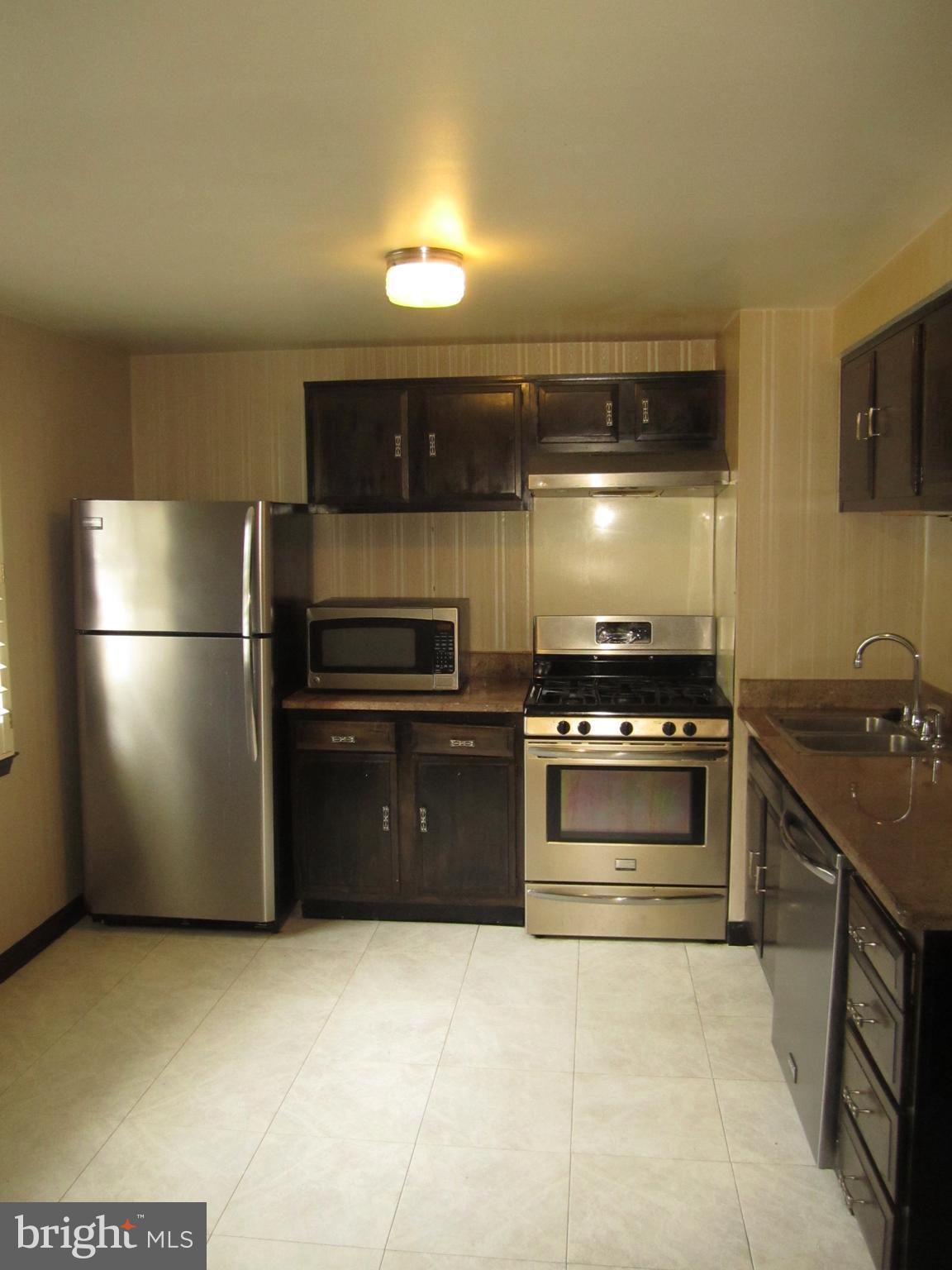 1236 Palmer Road, Unit 109 Fort Washington, MD 20744 - Photo 2 of 18 Kitchen with granite countertops