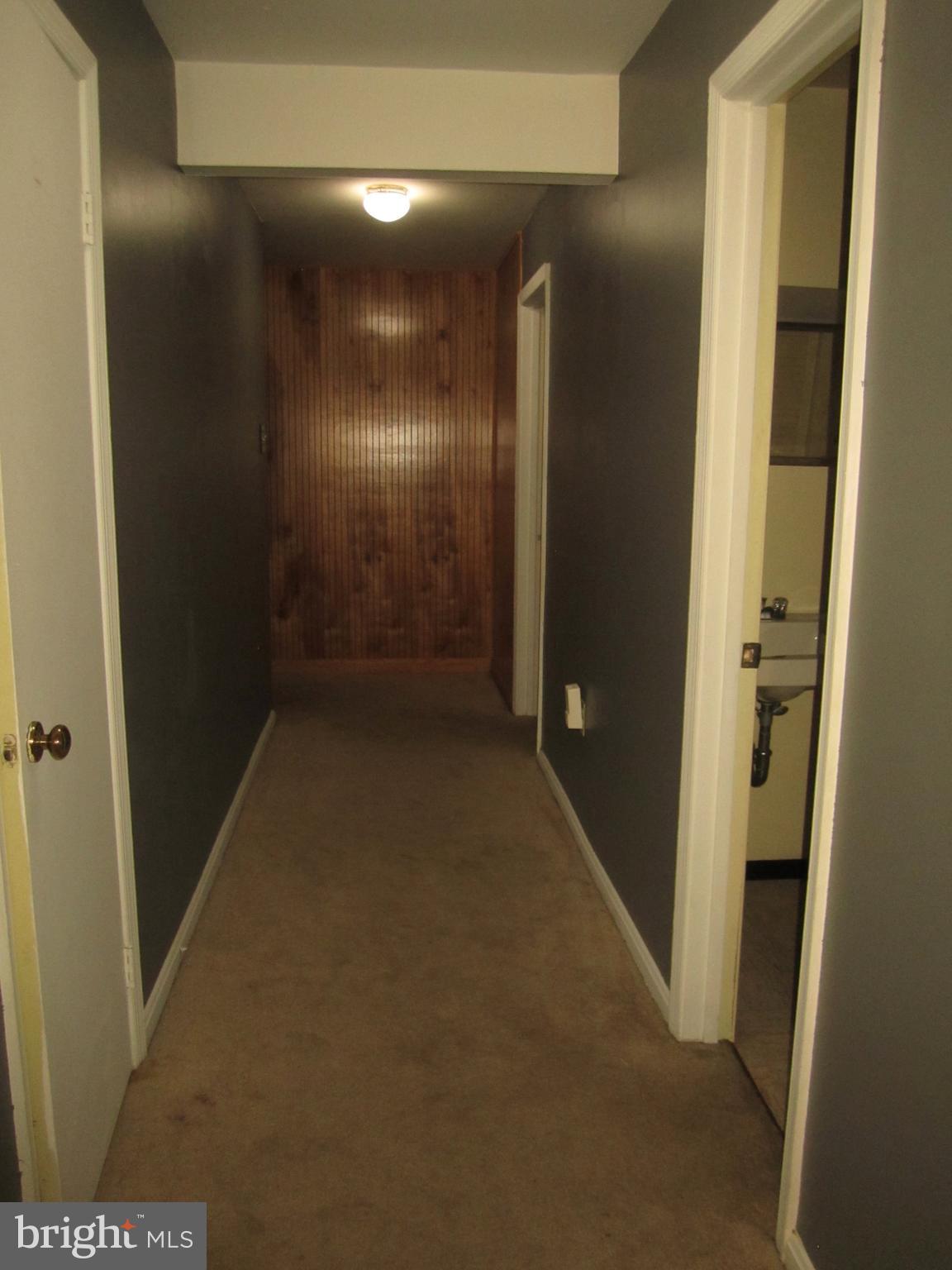 1236 Palmer Road, Unit 109 Fort Washington, MD 20744 - Photo 14 of 18 Basement hallway