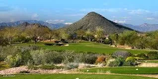 a view of a lake with a house