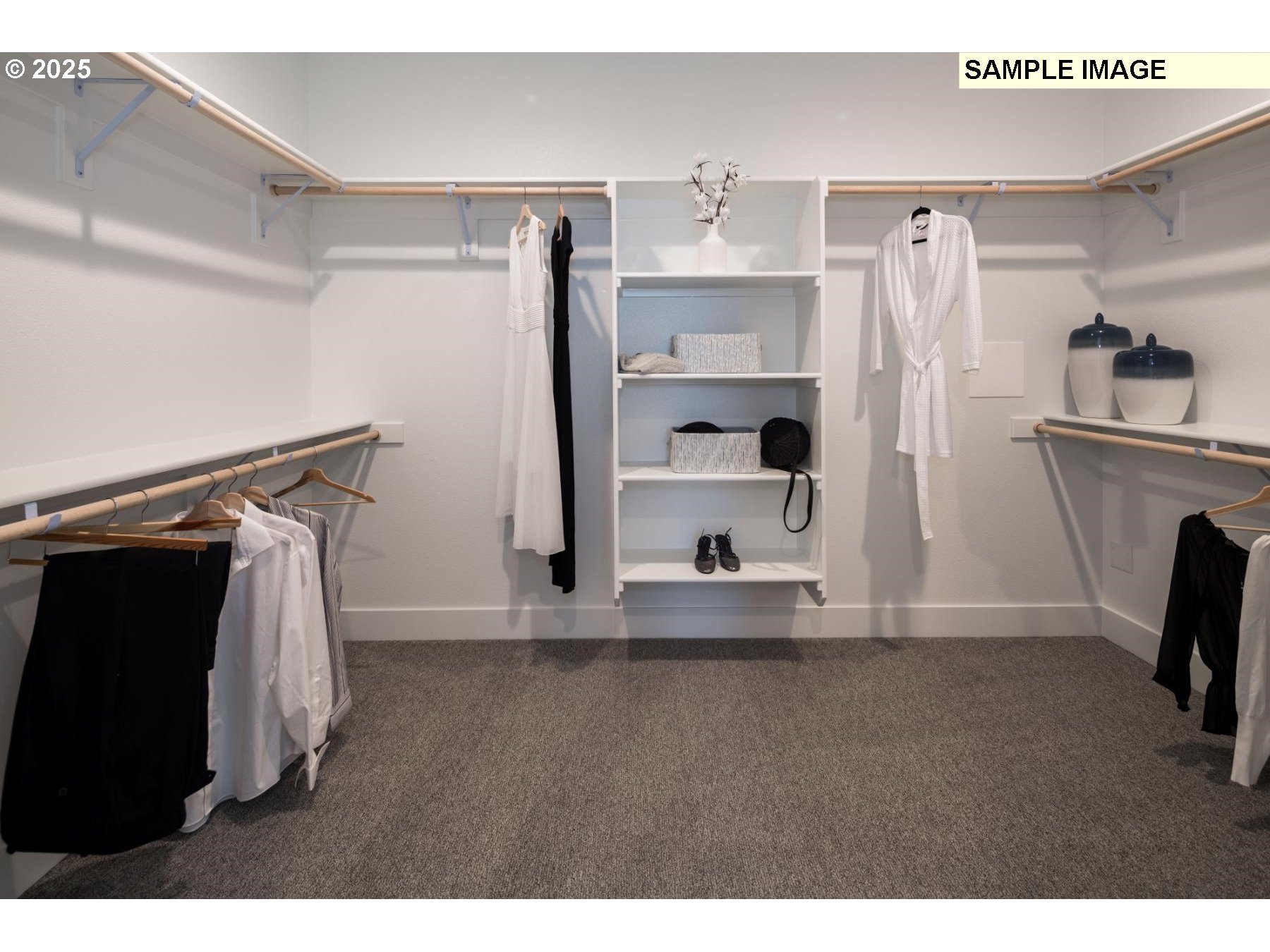 4208 North 15th Court Ridgefield, WA 98642 - Photo 18 of 26 a view of walk in closet with clothes and shoes