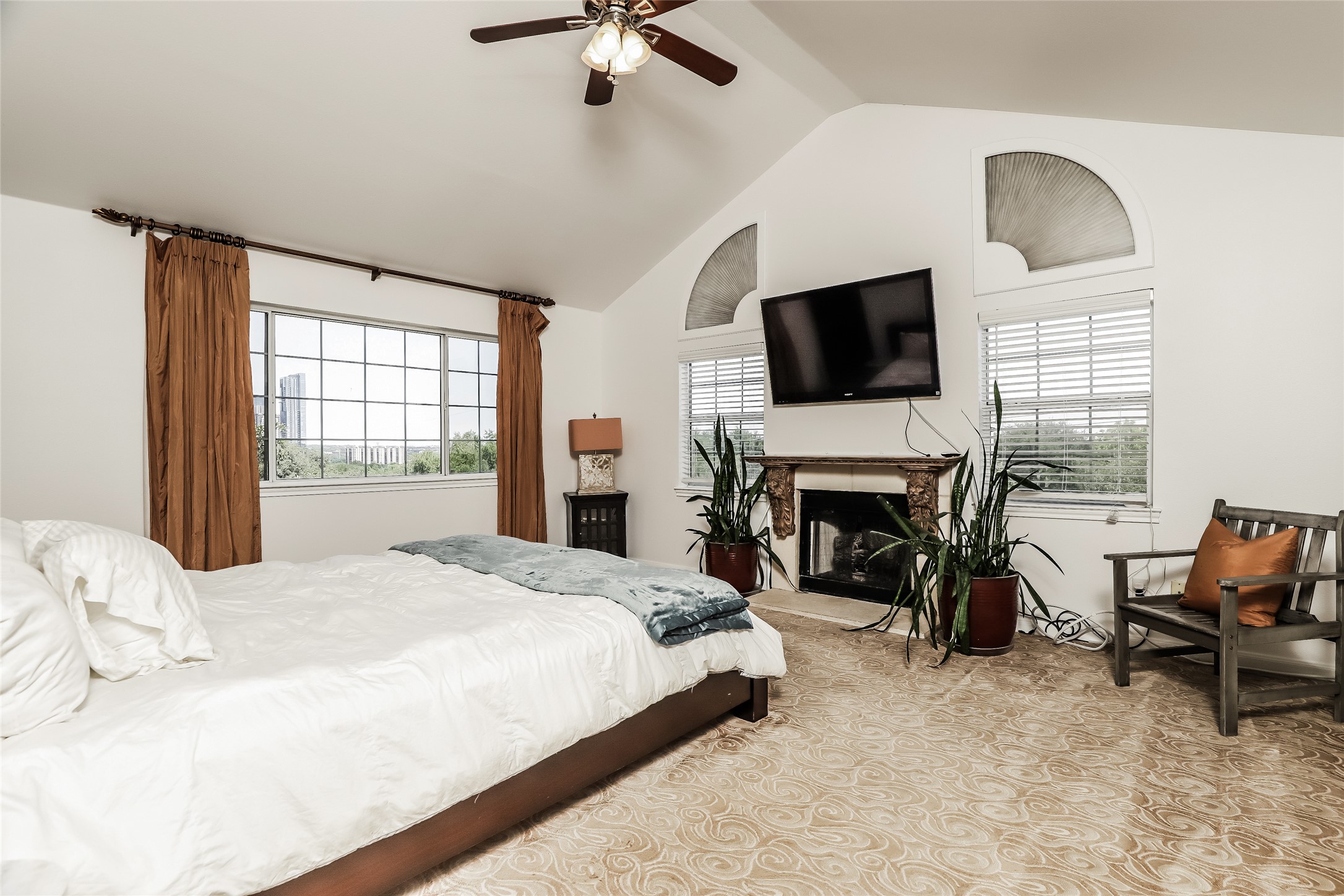 1702 Newning Avenue, Unit A Austin, TX 78704 - Photo 9 of 20 Vaulted ceiling with ceiling fan and light fixture