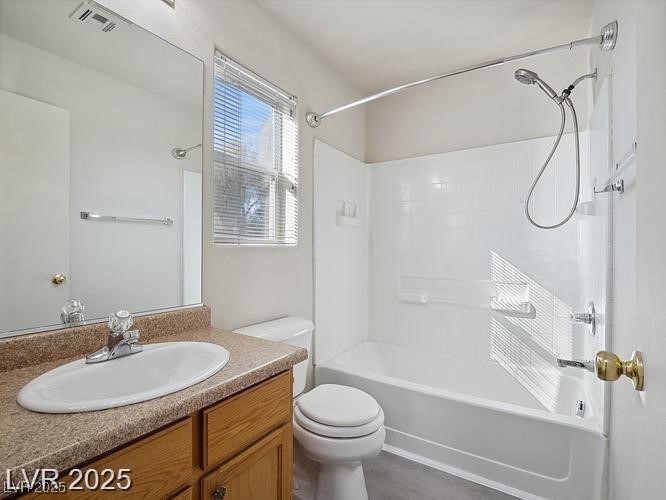 4675 Color Up Court, Unit 101 Las Vegas, NV 89122 - Photo 12 of 19 Full bath with vanity, shower / washtub combination, and dark wood-style floors