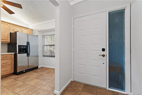 a kitchen with a sink and a stove top oven