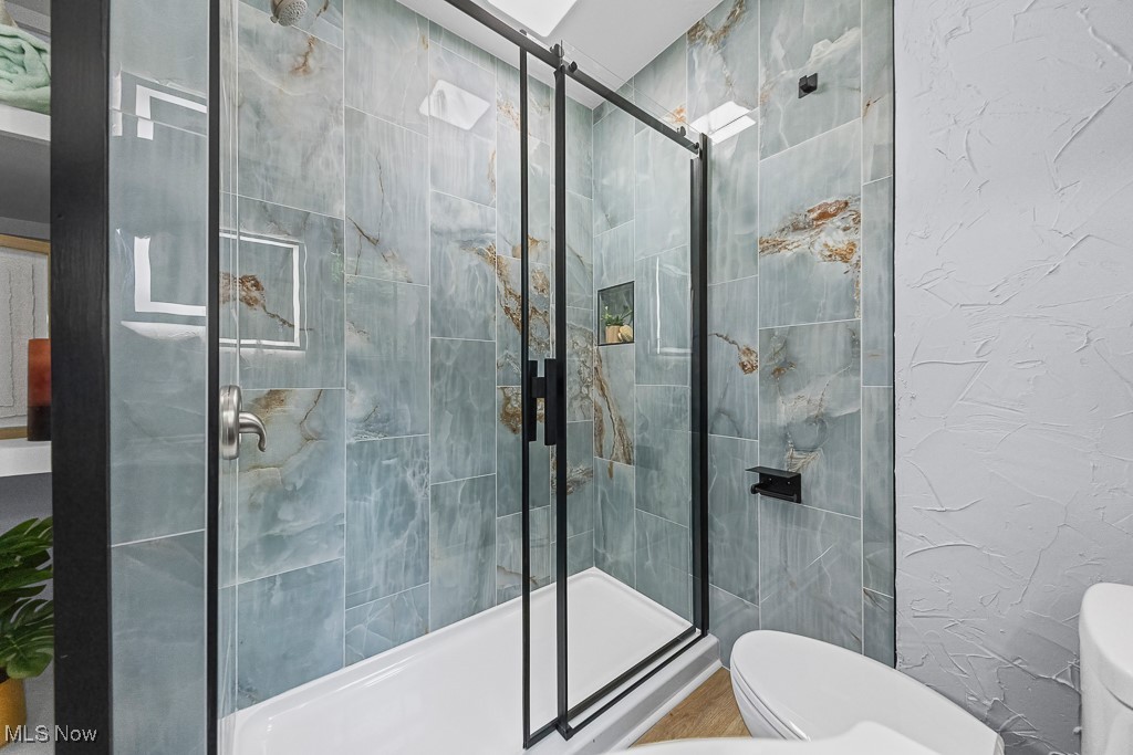 3549 Kent Road Stow, OH 44224 - Photo 22 of 44 Bathroom featuring toilet and a stall shower