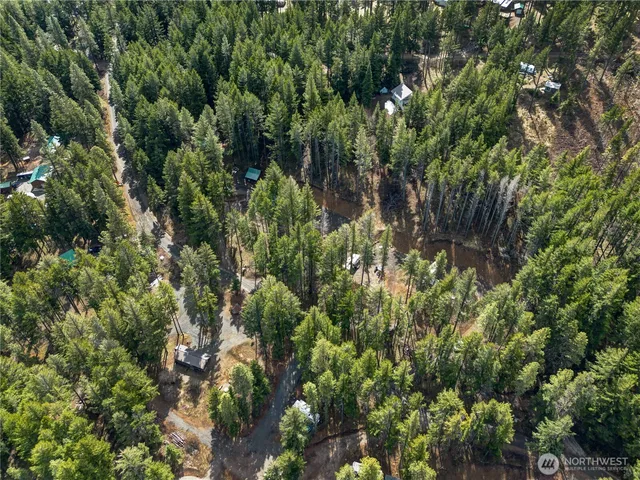 a view of a swimming pool with a yard
