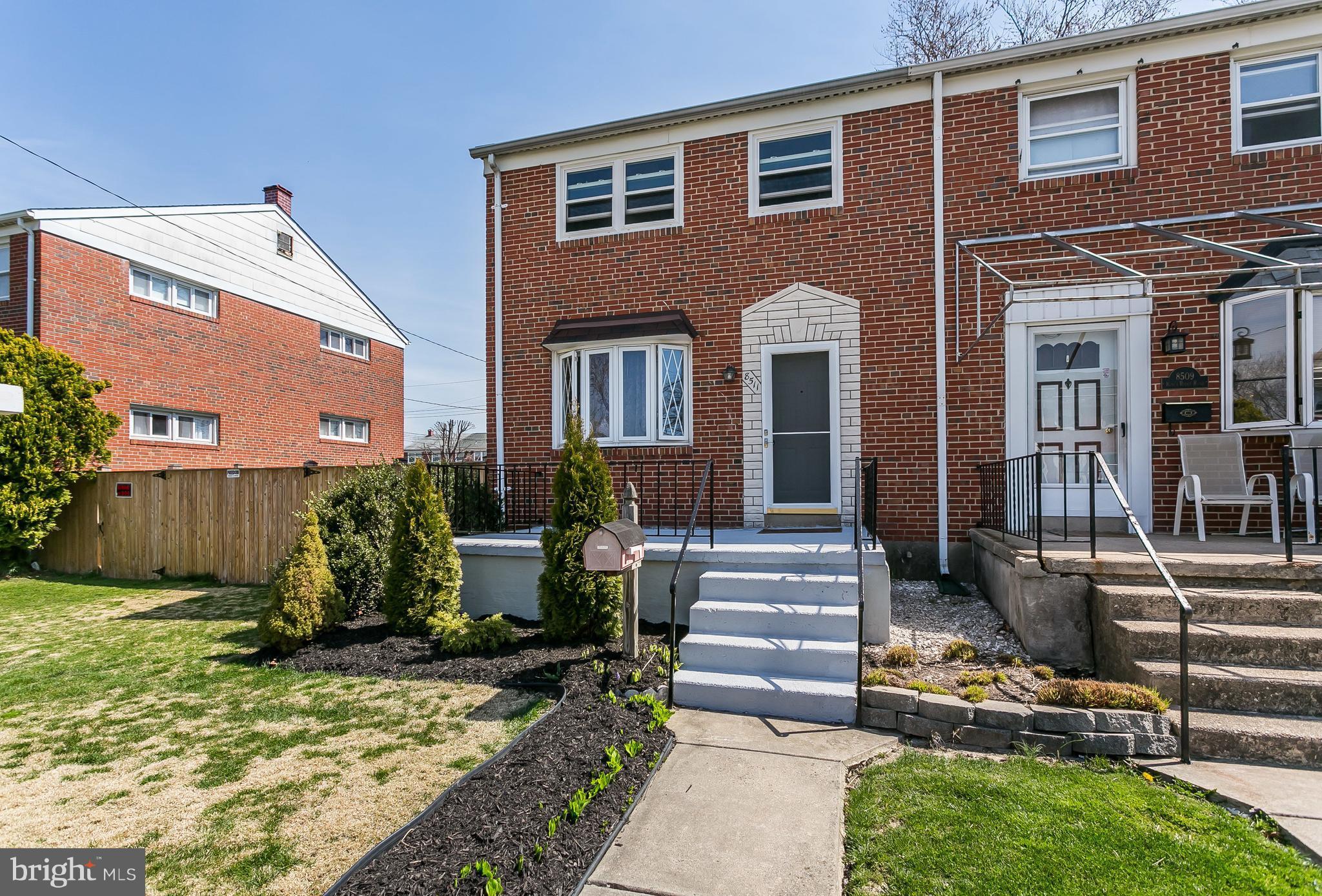 8511 Kings Ridge Road Baltimore, MD 21234 - Photo 2 of 30 a front view of a house with garden
