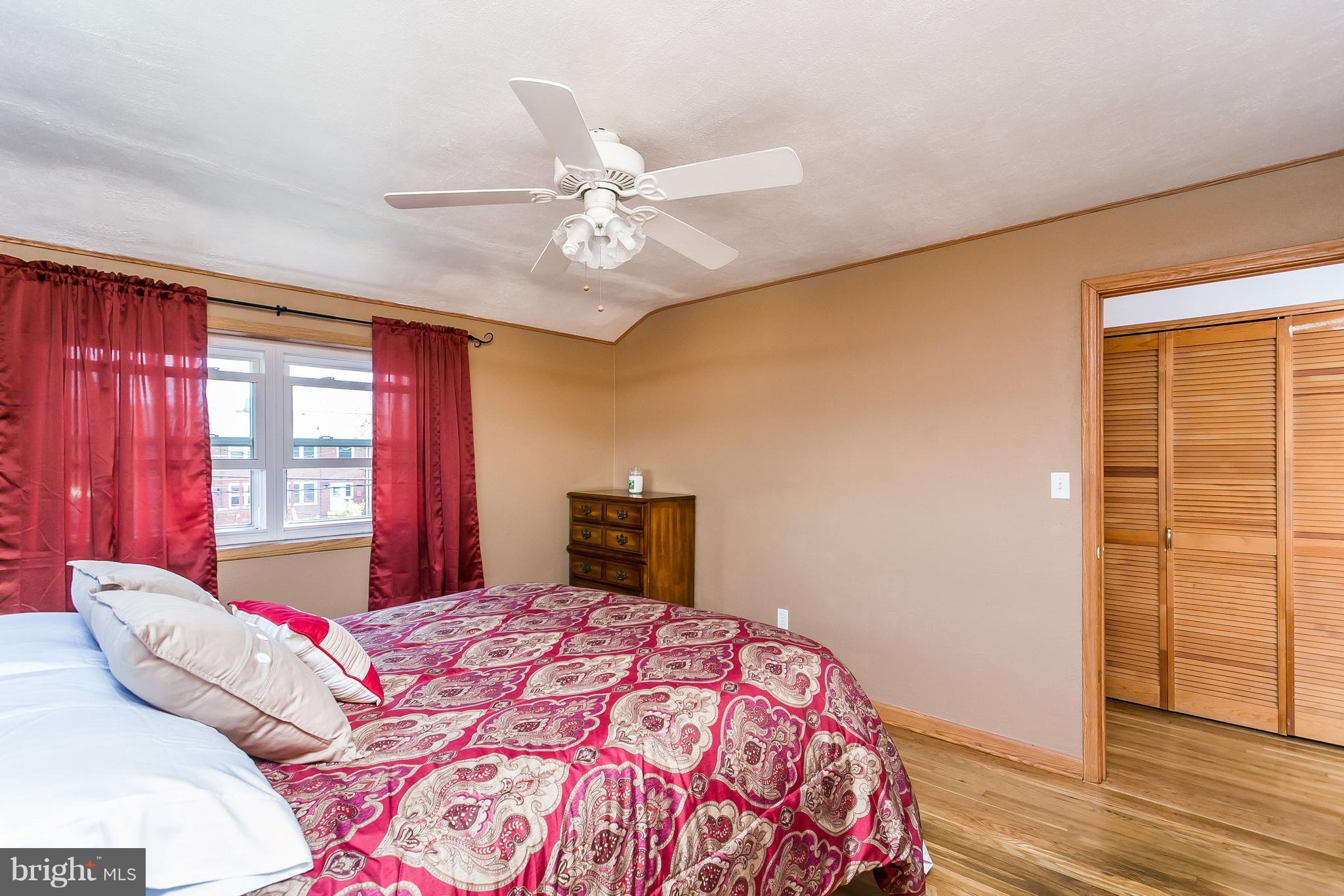 8511 Kings Ridge Road Baltimore, MD 21234 - Photo 13 of 30 a bedroom with a large bed and a window