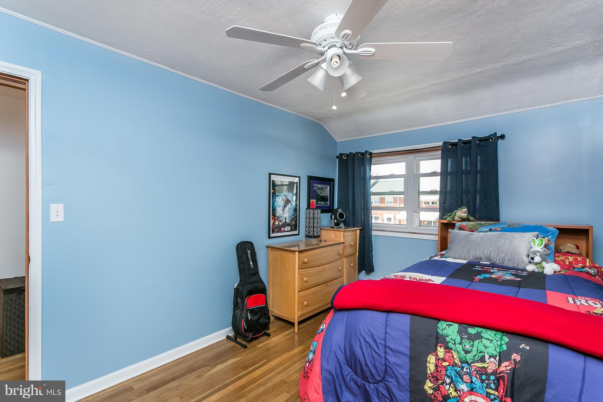 8511 Kings Ridge Road Baltimore, MD 21234 - Photo 15 of 30 a bed room with furniture and a window