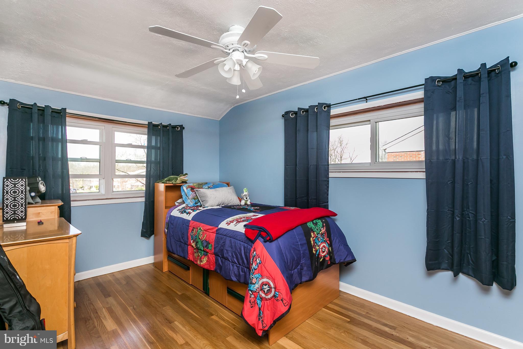 8511 Kings Ridge Road Baltimore, MD 21234 - Photo 17 of 30 a bedroom with bed and window