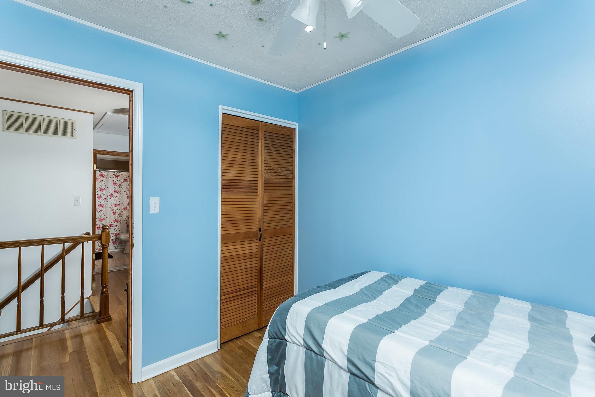 8511 Kings Ridge Road Baltimore, MD 21234 - Photo 20 of 30 a bedroom with a bed and a window