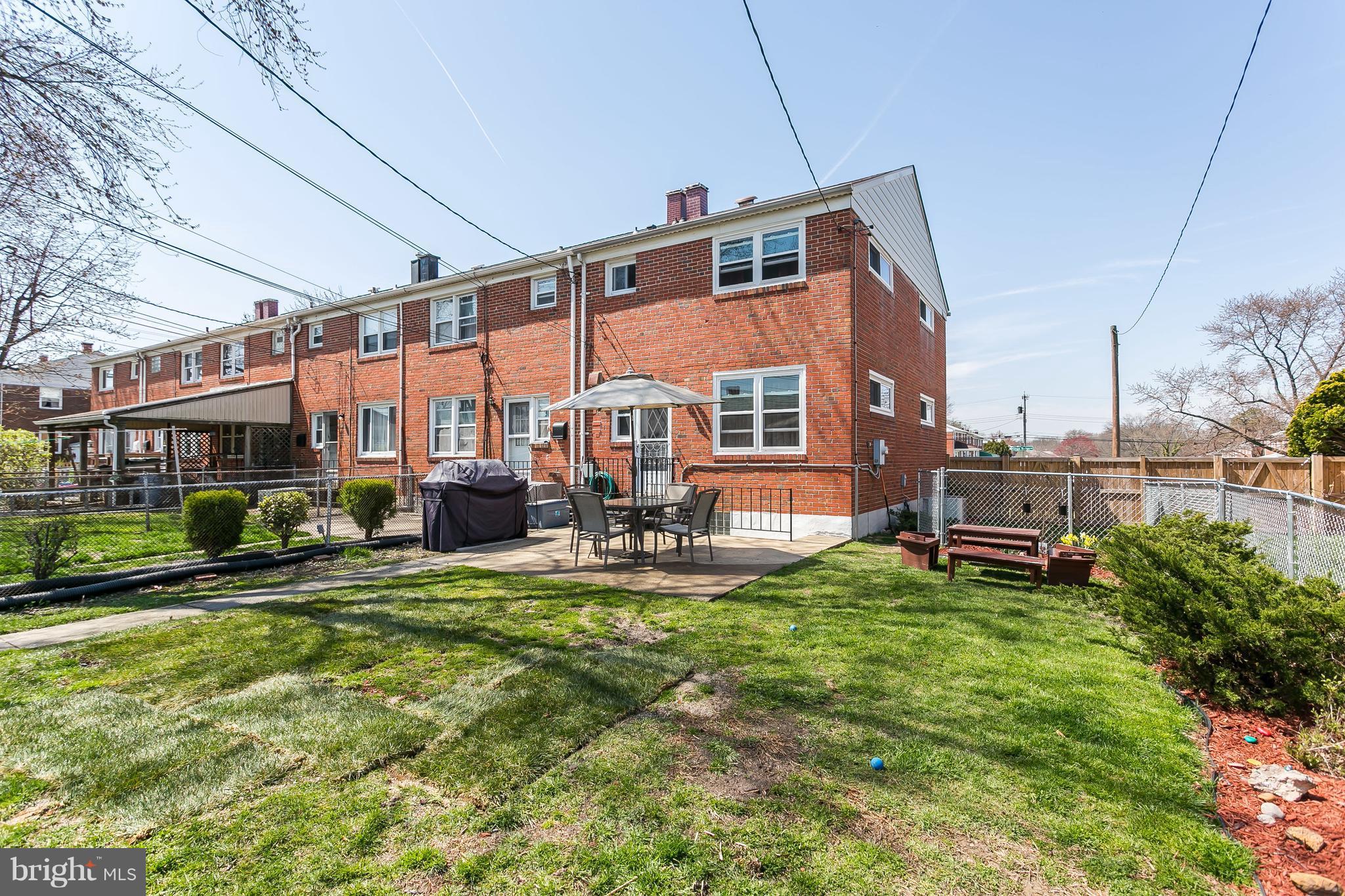 8511 Kings Ridge Road Baltimore, MD 21234 - Photo 28 of 30 a view of a house with a yard patio and swimming pool