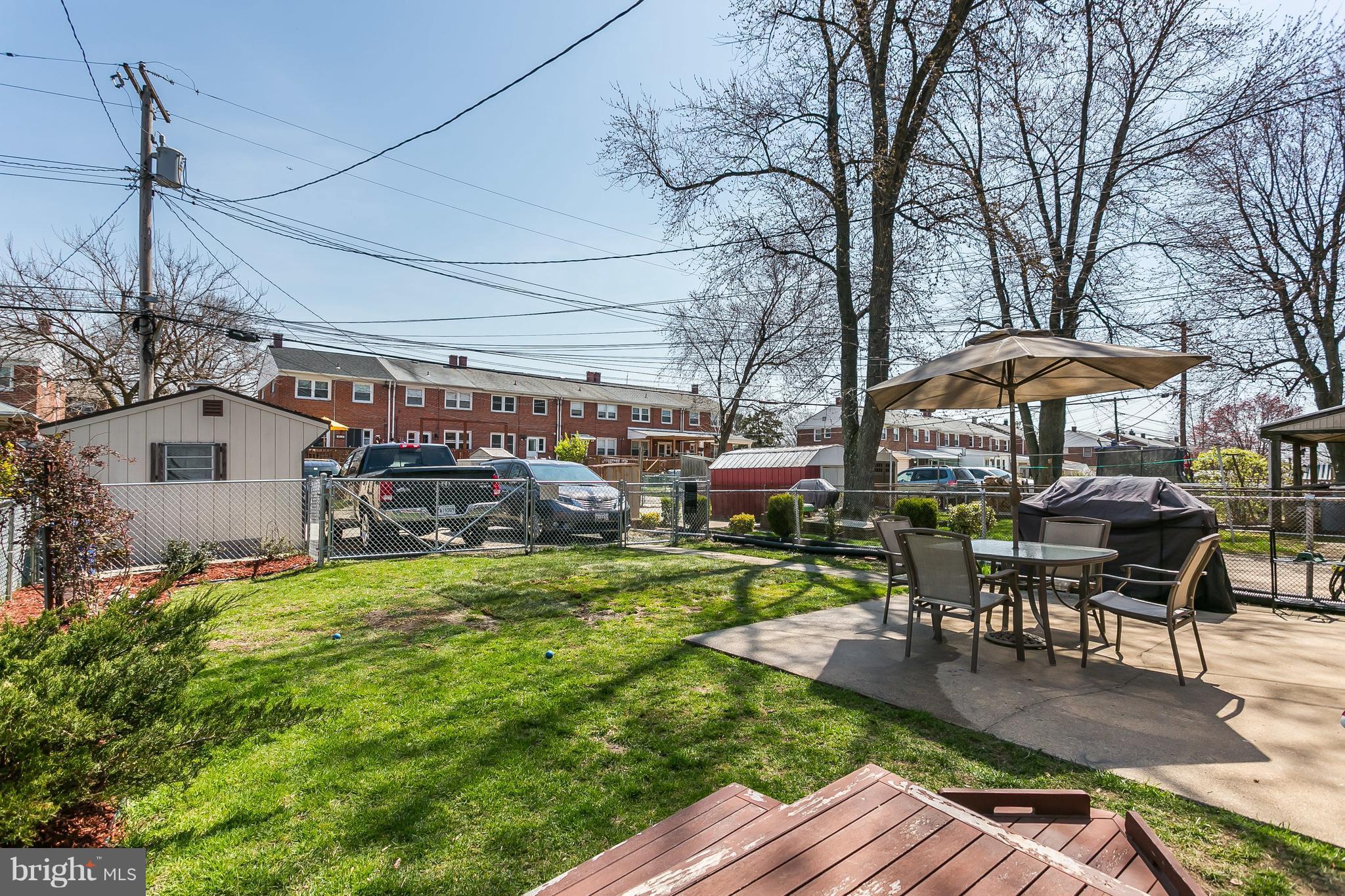 8511 Kings Ridge Road Baltimore, MD 21234 - Photo 29 of 30 a view of a house with backyard porch and sitting area