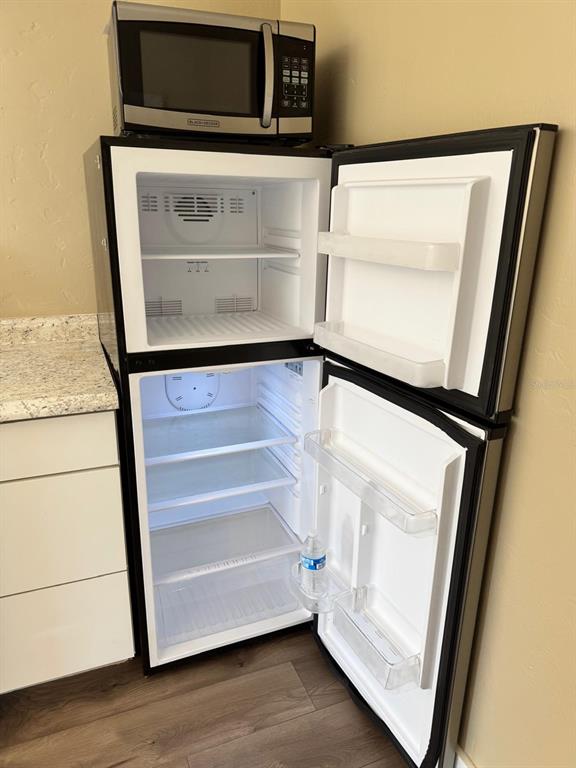 2241 Burnway Road, Unit 2241 Haines City, FL 33844 - Photo 17 of 20 a view of walk in closet with empty racks