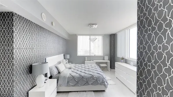 a bedroom with a bed and a couch