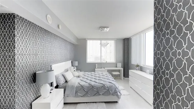 a bedroom with a bed and a couch