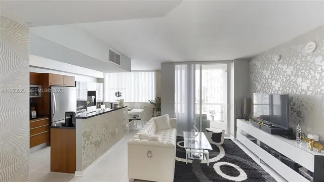 a kitchen with a sink stove and refrigerator