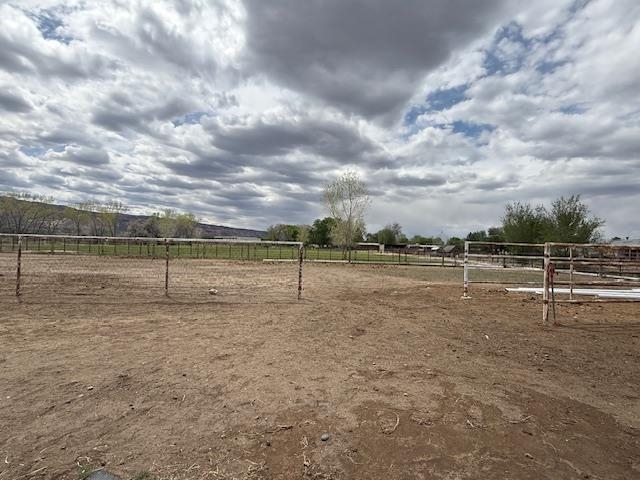 851 21 Road Fruita, CO 81521 - Photo 4 of 17 a view of a field with wooden fence
