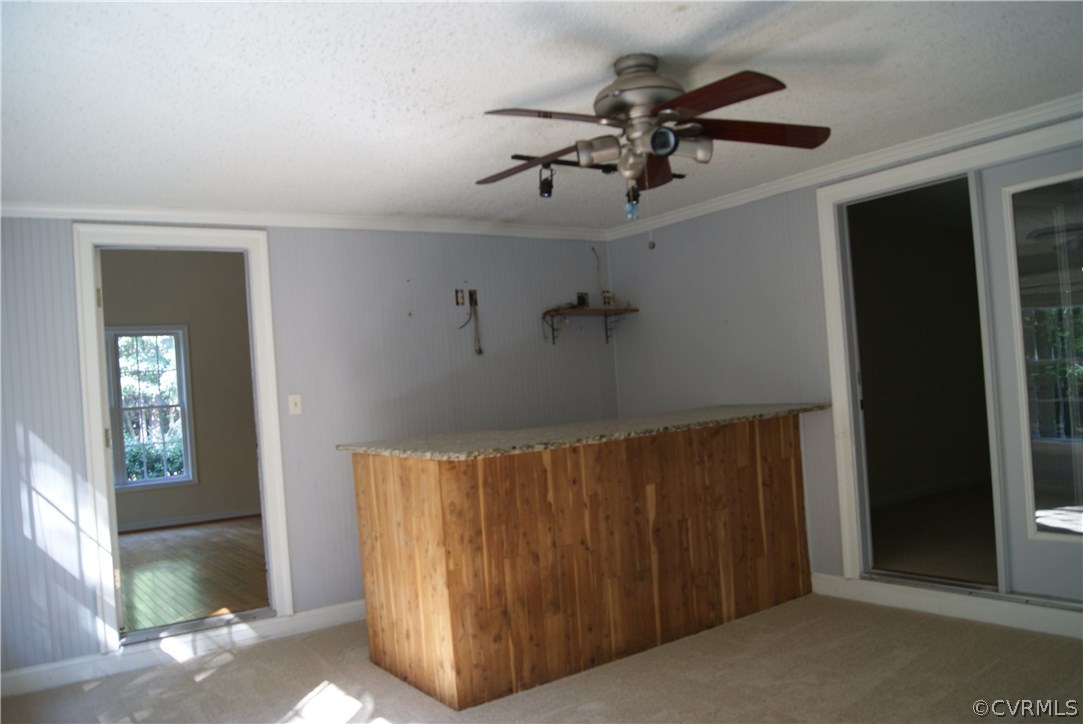 9610 Cattail Road Chesterfield, VA 23838 - Photo 14 of 17 a view of a hallway with a dining table and a mirror