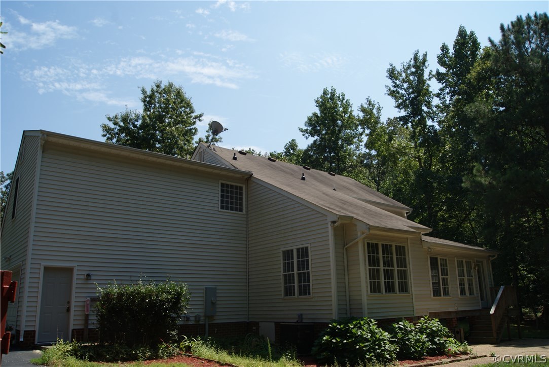 9610 Cattail Road Chesterfield, VA 23838 - Photo 3 of 17 a view of a house with a yard
