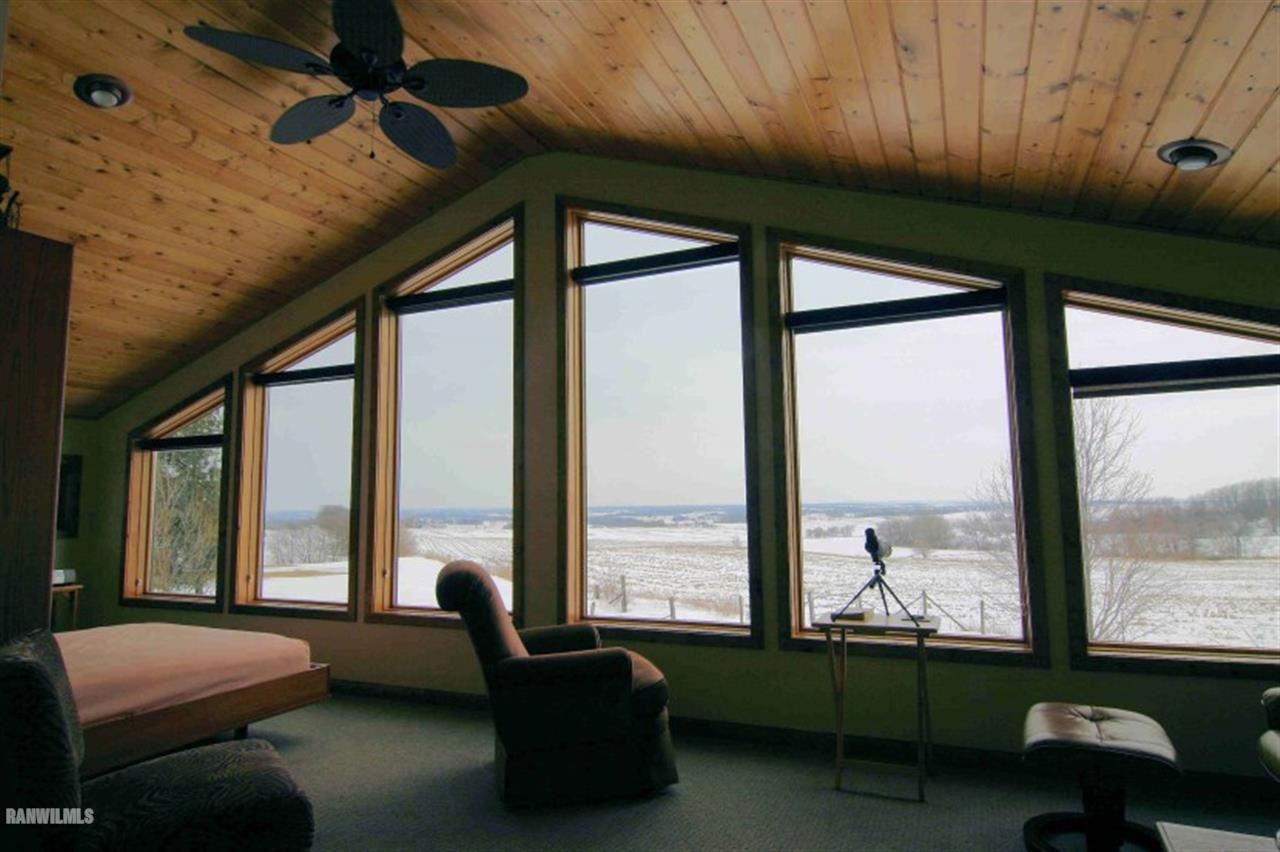 8477 West Mound Road Lena, IL 61048 - Photo 14 of 25 a living room with furniture and a large window