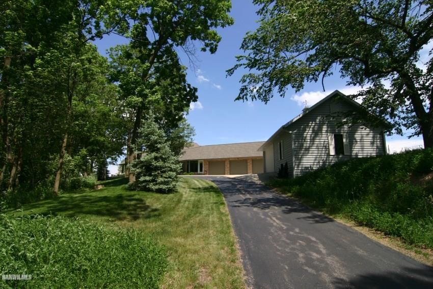 8477 West Mound Road Lena, IL 61048 - Photo 2 of 25 a backyard of a house with lots of green space