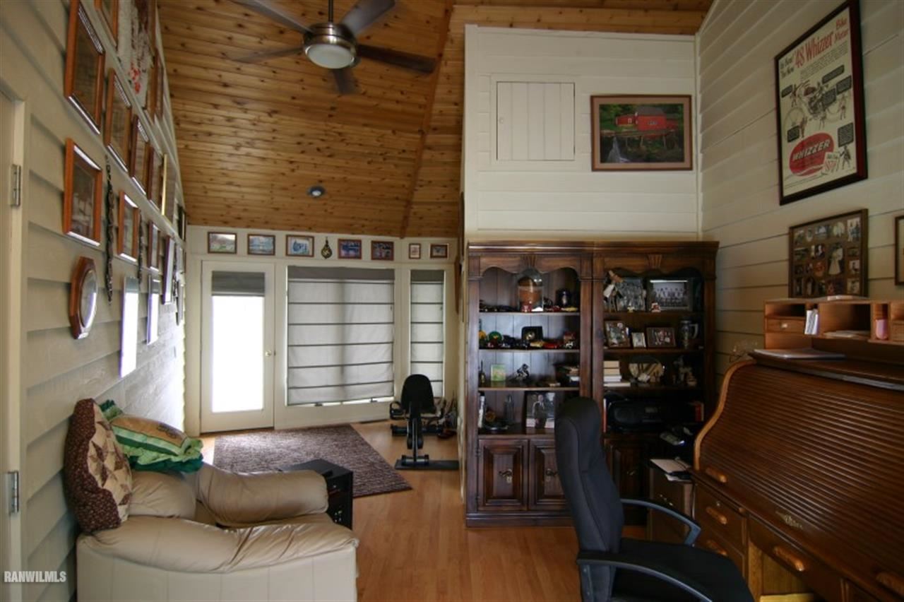 8477 West Mound Road Lena, IL 61048 - Photo 25 of 25 a living room with furniture and a window