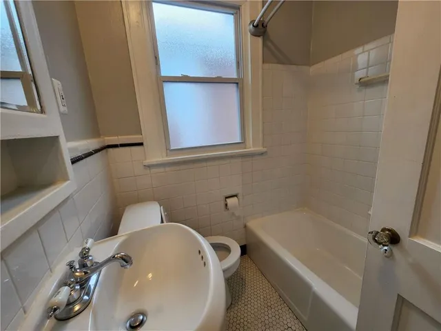 a bathroom with a sink and a tub