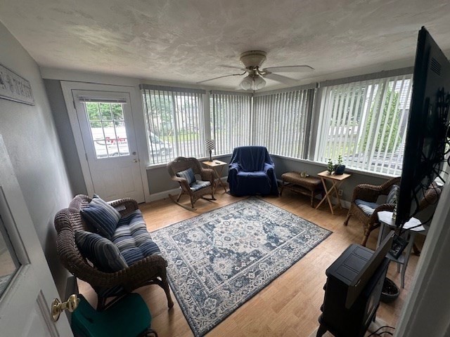 84 Lincoln Street Hudson, MA 01749 - Photo 16 of 26 a living room with furniture rug and a window