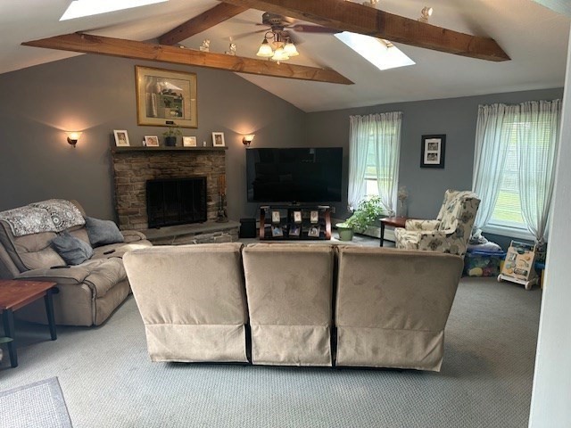 84 Lincoln Street Hudson, MA 01749 - Photo 4 of 26 a living room with furniture a fireplace and a flat screen tv