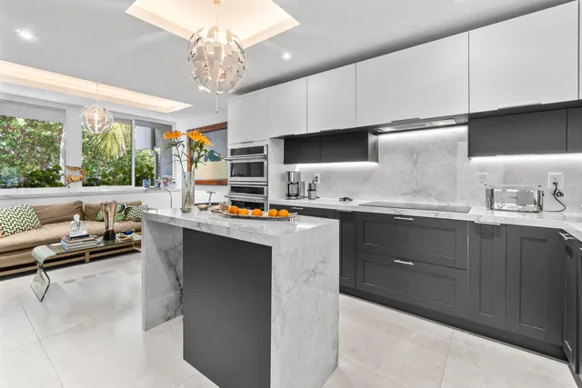 a bathroom with a toilet a sink and a mirror