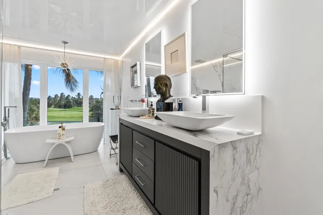 a view of walk in closet and window