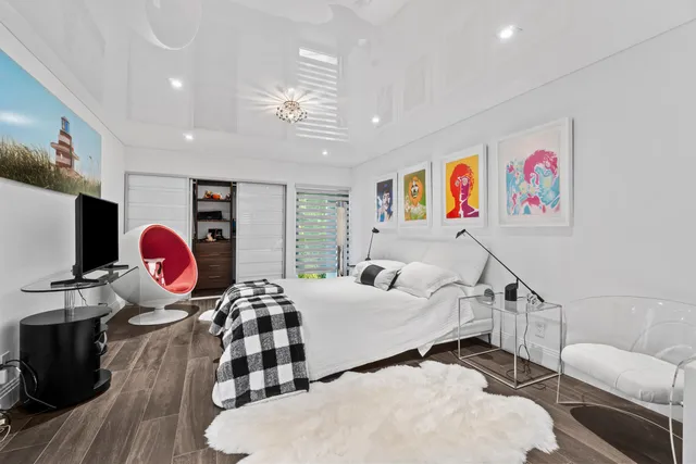 a view of a park with palm trees