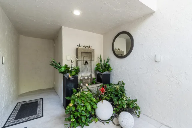 a view of entryway livingroom and hall