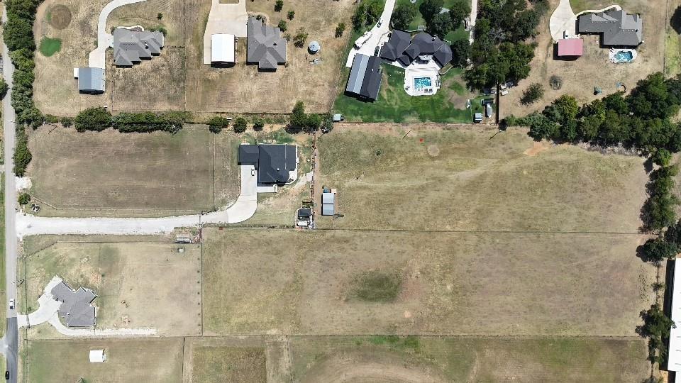 Tbd Rock Hill Road Aubrey, TX 76227 - Photo 5 of 12 a bathroom with a sink and a mirror