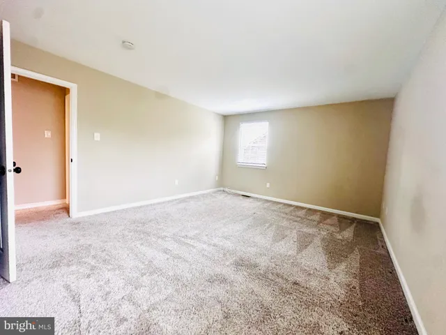 an empty room with a natural light