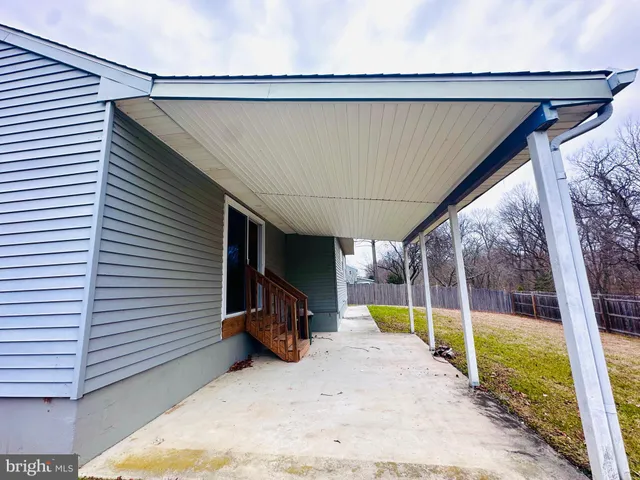 a view of a swimming pool with a porch