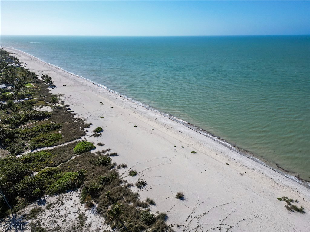 1016 Fish Crow Road Sanibel, FL 33957 - Photo 1 of 12 a view of an ocean beach