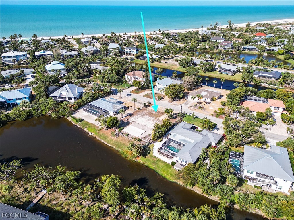 1016 Fish Crow Road Sanibel, FL 33957 - Photo 10 of 12 an aerial view of residential houses with outdoor space