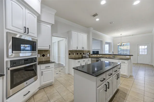 $695,000 | 10815 Ashland Bridge Lane, Sugar Land, TX 77498