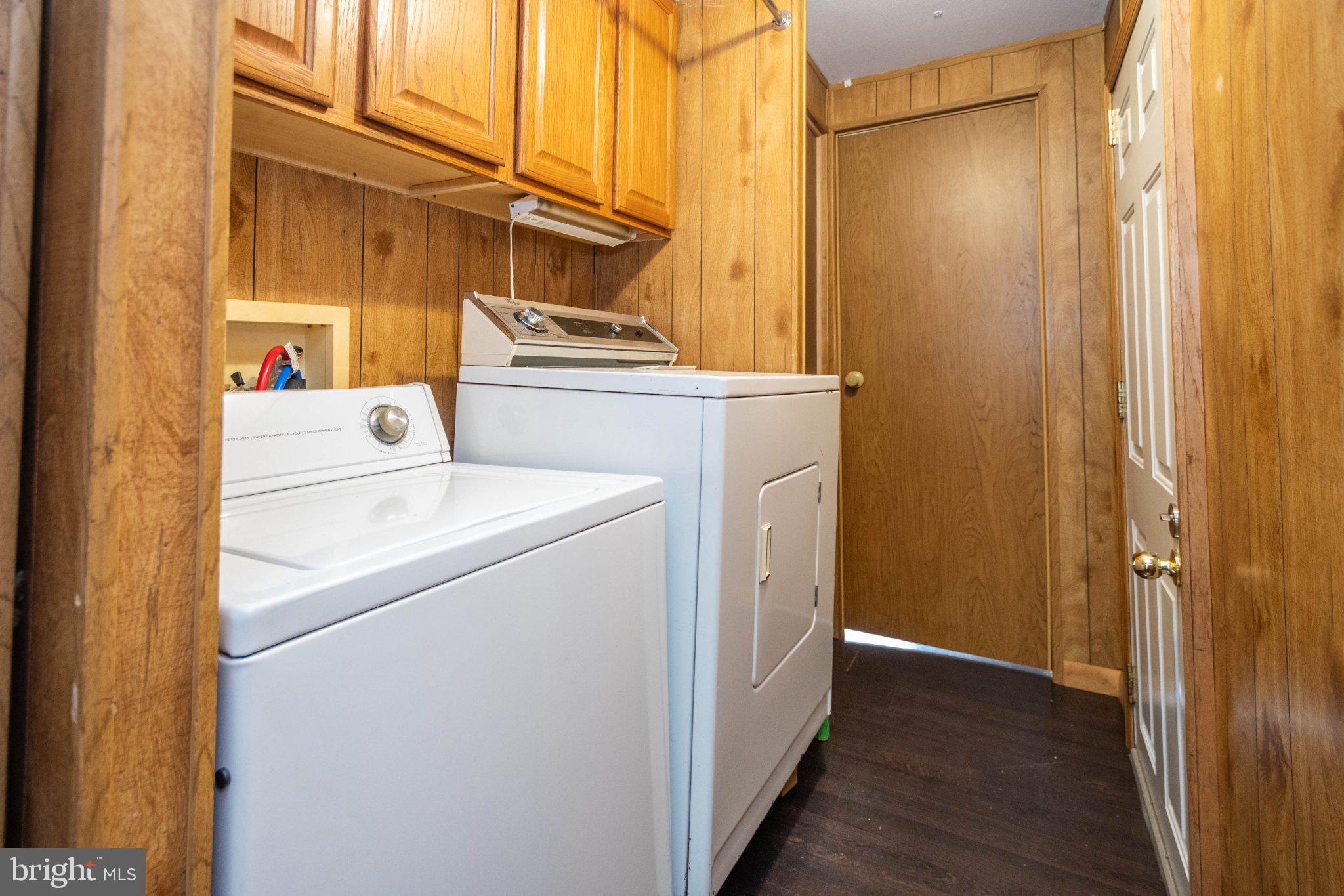 2165 Jennings Road Jennings, MD 21536 - Photo 20 of 23 Cozy laundry nook with wooden accents.