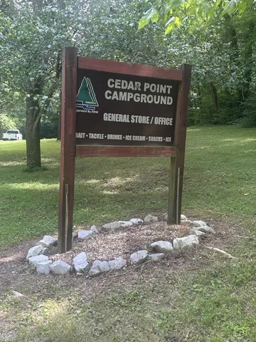 a view of a lake with houses in the back