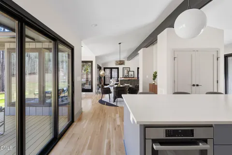 a bedroom with a bed a window and couch