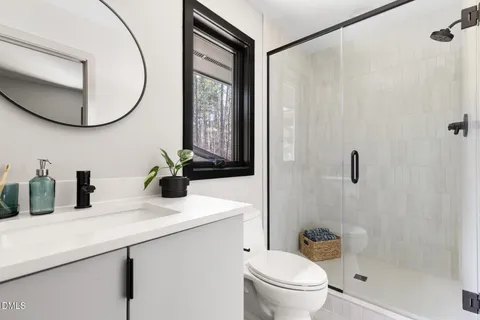 a aerial view of a house with a yard