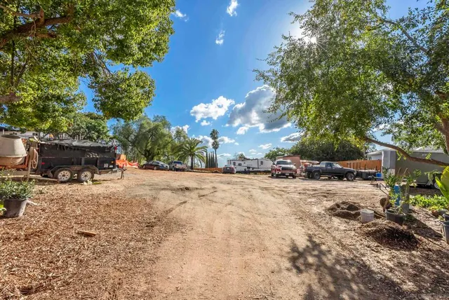 a view of a car park in front of house