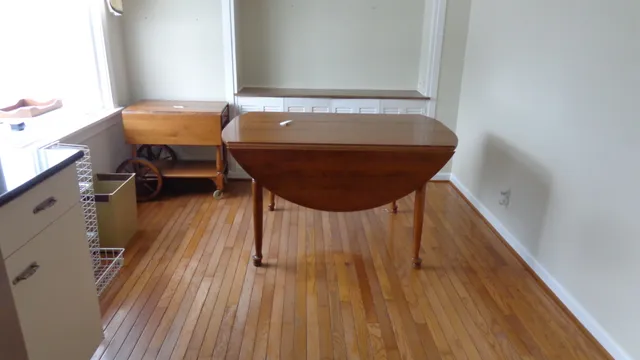 a room with table and chairs