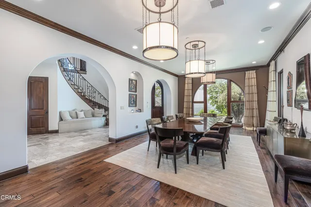 a kitchen with stainless steel appliances granite countertop a stove and a refrigerator
