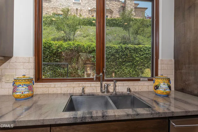a living room with fireplace furniture and a flat screen tv