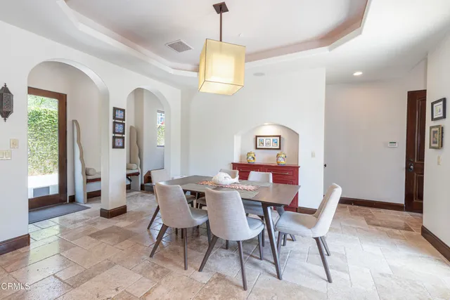 a bathroom with a sink mirror toilet and vanity